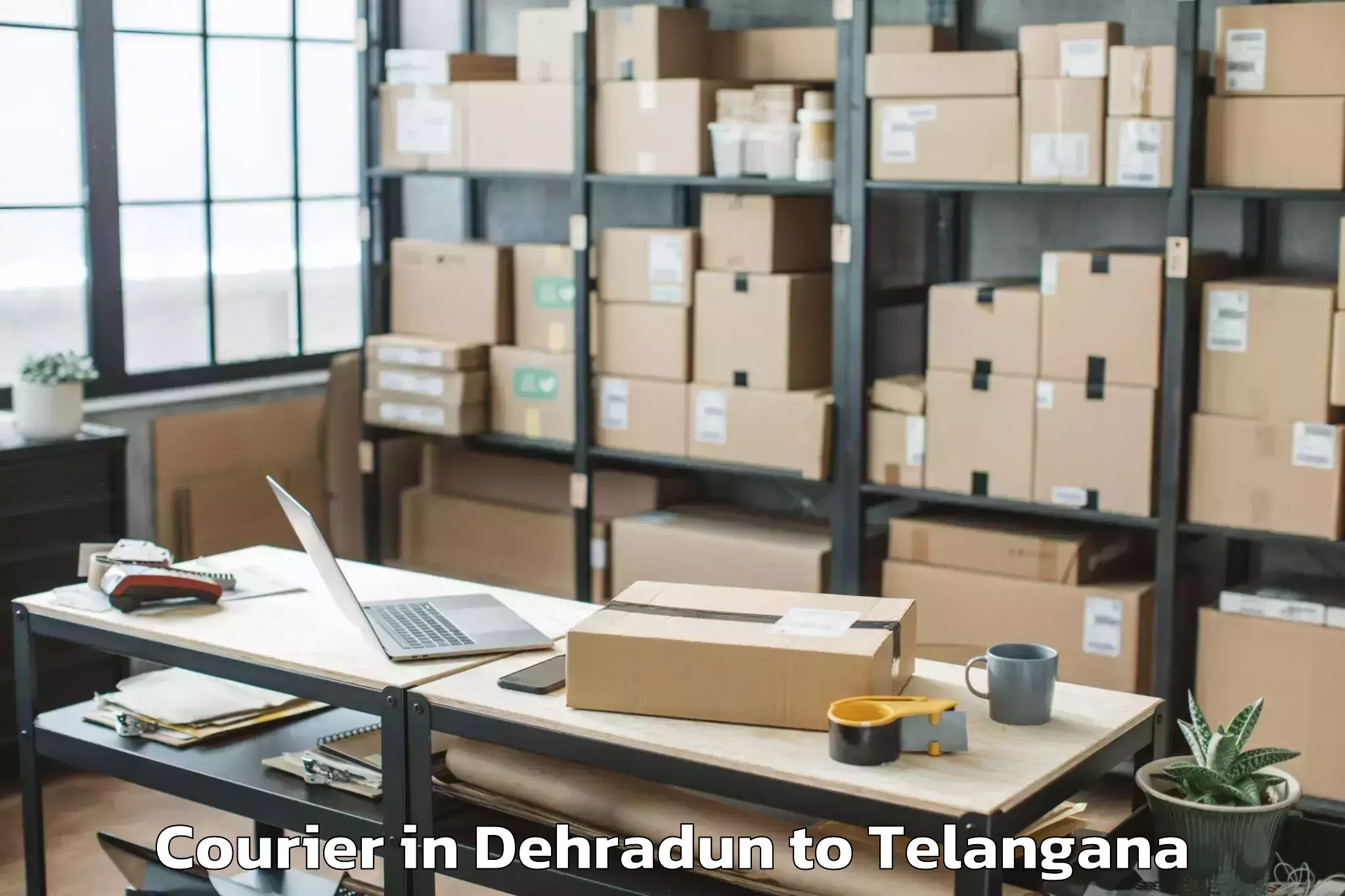 Easy Dehradun to Kamareddi Courier Booking